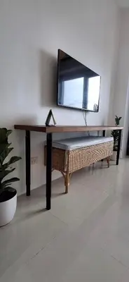 a desk with a mirror and a bench underneath it at Hideouts & Hangouts in Manila
