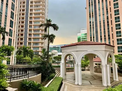 a gazebo in a city with tall buildings at Cozy home Near NAIA & BGC in Manila