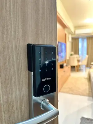 a hotel room with a wyncote card reader on a wall at Cozy and Aesthetic Condo at Shore 3 in MOA, Pasay in Manila
