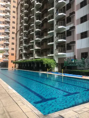 an empty swimming pool in front of a building at The RADIANCE MANILA BAY in Manila