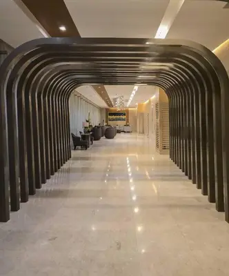 a hallway in a building with a long hallwayngth at Cozy apartment near Airport in Shore 3 in Manila
