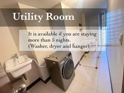 a bathroom with a toilet and a sink at 2 Bedrooms & 2 Bathrooms at BGC Taguig McKinley by Venice Grand Canal mall in Manila