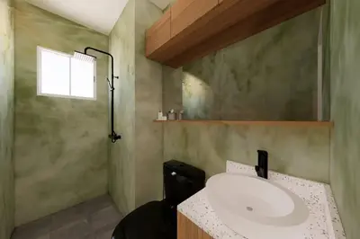 a bathroom with a sink and a mirror at Near Manila Airport, COZY Hotel Style Studio Condo 5G in Manila