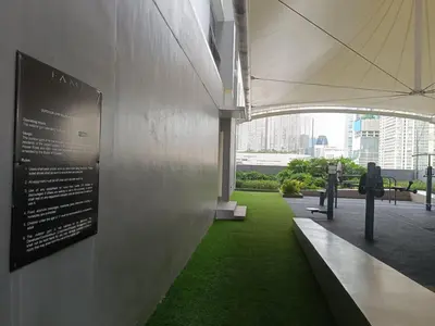 a building with a sign on the side of it at Cozy Staycation at Destiny's Crib Fame, Edsa Mandaluyong in Manila
