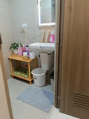 a bathroom with a sink and a toilet at Cozy Staycation at Destiny's Crib Fame, Edsa Mandaluyong in Manila