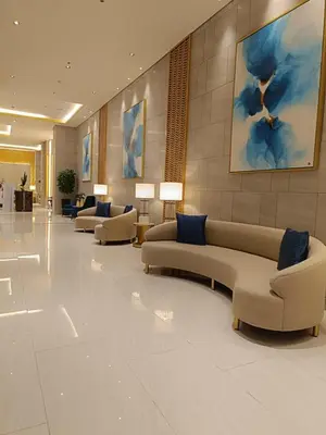 a lobby with couches and chairs in a building at Cozy Staycation at Destiny's Crib Fame, Edsa Mandaluyong in Manila