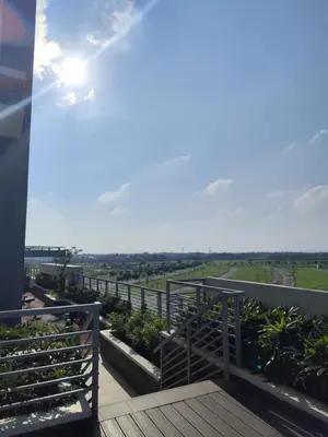 a view from the balcony of a building at Amelia's Crib at The Verdin in General Trias