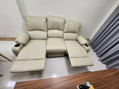 a white leather couch sitting in a living room at Mocha Flat at Shore 3 Tower 4 in Manila