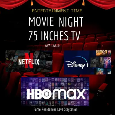 a poster for a movie night inches tv at Fame Residences Mandaluyong 1 BR with two Big TV with Balcony in Manila