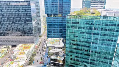 an aerial view of a city with tall buildings at BGC High Rise, Uptown Mall Link, 5G WiFi, Pool, Ste 29 in Manila