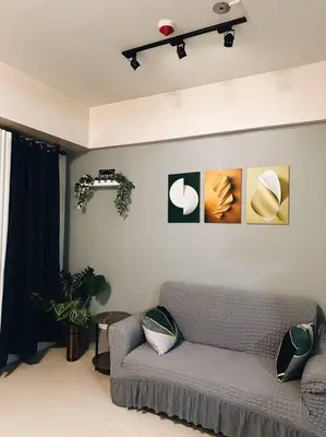 a living room with a couch in a room at The Serenity Studio in Manila