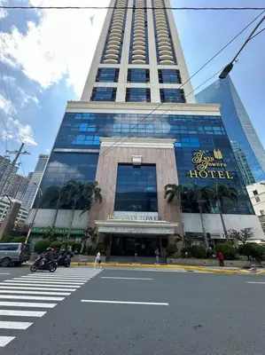 a large building with a hotel in front of it at 1br wNetflix Disneyplus and pool across SM Megamall Ortigas CBD in Manila