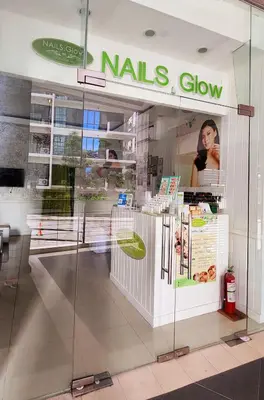 a nalls store with a sign on the window at xxxCozy Family Retreat 8 mins walk from Venice Grand Canal Mall BGC fits 5 pax in Manila