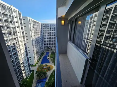 a view of a balcony of a building with buildings at Lourdes' Place, Shore 2-Tower 1, 2 Beds, Pasay near Mall of Asia in Manila