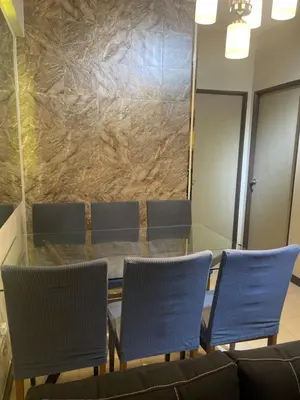 a conference room with blue chairs and a table at Mirea Residences Pasig- Two Bedroom Condo Unit with Balcony 70sqm in Manila