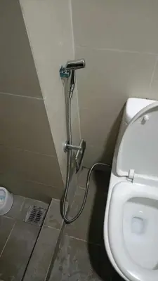 a shower in a bathroom with a toilet at Coast Residence Sea View Balcony Netflix WiFi Near MOA 3146 in Manila