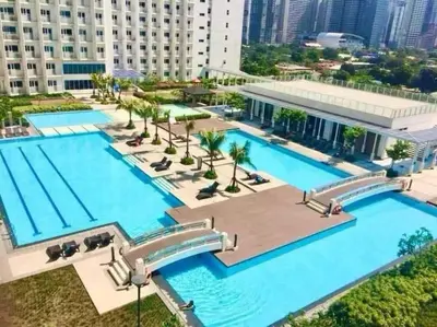 an aerial view of the pool at a hotel at Jazz Apartment Unit in Manila