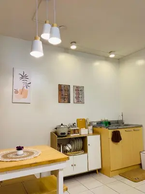 a kitchen with a table and a counter top at Fablo Getaway in Santa Rosa