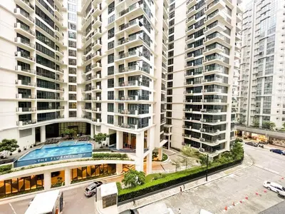 an overhead view of a building with tall buildings at Prime Condo Living Near Venice Canal #msert26k in Manila