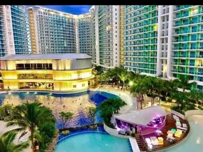 an aerial view of a resort with a pool at Azure urban resort residences, BAHAMAS tower Japandi model in Manila