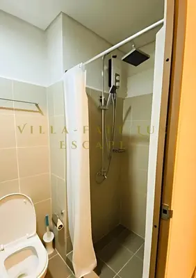 a bathroom with a shower and a toilet at 1 Bed Room Coast Residence at Heart of Metro Manila - Pasay City in Manila