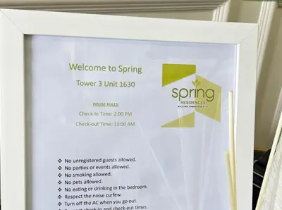 a welcome to spring sign on a wall at Golden Scape 1 Bedroom near NAIA Airport in Manila