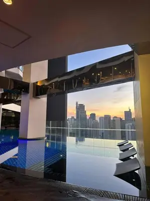 a view of a city skyline from a building at Spacious 1 Bedroom in Gramercy 2 balconies in Manila