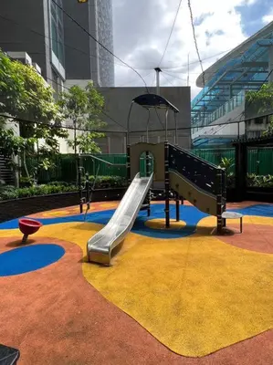 a playground with a slide in a building at 45F Gramercy Corner Studio Wifi Netflix SmartTV free use Pool Gym in Manila