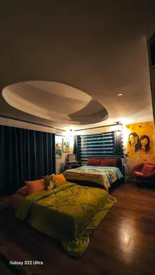 a bedroom with two beds in a room at Elegant Villa in Manila