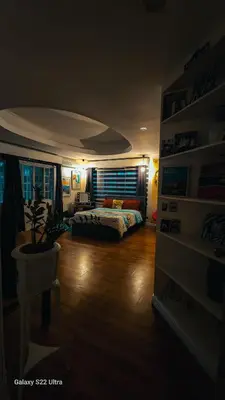 a bedroom with a bed in a room at Elegant Villa in Manila