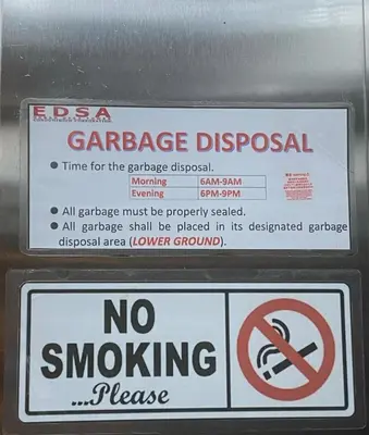 a no smoking sign on a parking meter at Urban Hive 1821 in Manila