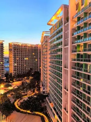 an aerial view of a city with tall buildings at Azure Playfull Living 1 bedroom in Manila