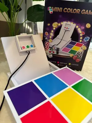 a video game and a box on a table at Cozy 1BR nr Ortigas Makati & BGC with Secured Parking in Manila