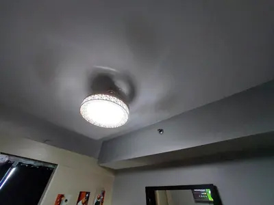 a light on the ceiling of a room at Sea Residences Condo SM Mall of Asia Entertainment District in Manila