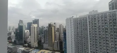 a view of a large city with tall buildings at Aircon Budget Room for 4 persons in Makati in Manila
