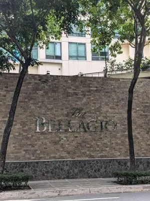 a brick wall with the word belize written on it at Bellagio One Bedrroom BGC Burgos Circle by Christine Suites PH in Manila