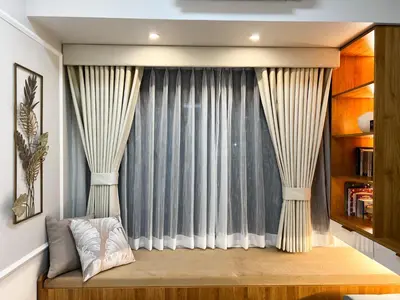 a large window with curtains in a bedroom at BRAND NEW Casa Airabella with Netflix & Makati City Skyline in Manila