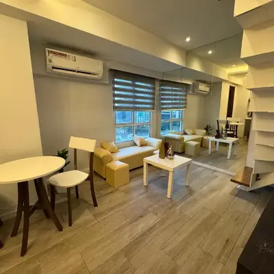 Cozi Modern Loft Suite near high street BGC wifi pool