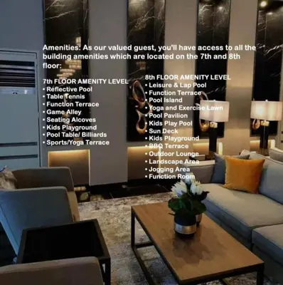 a living room with a couch and a table at Air Residence in Manila