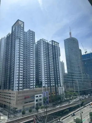 a group of tall buildings in a city at Hotel in Mandaluyong in Manila