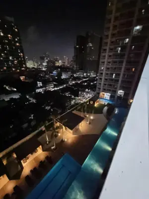 a view from the rooftop of a building at night at 1554 Apartel Breeze Resident in Manila
