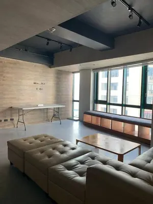 a living room with a couch and a table at 63 sqm Unit for GET TOGETHER at Poblacion, Makati with Private Parking in Manila