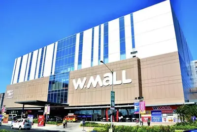 a large building with the word windmill on it at S Residences Two Beds Room Near MOA Pasay Manila in Manila