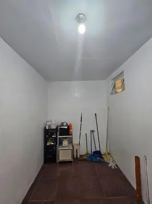 an empty room with a white wall and a white ceiling at Alohas House in Cupang