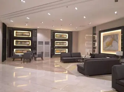 a large living room with couches and chairs at 1BR Condotel with Balcony at FAME Residences #FM56 in Manila