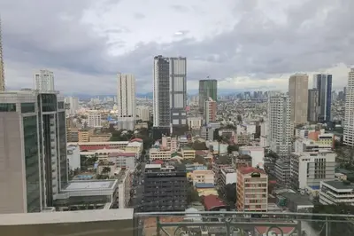 a view of a city with tall buildings at Alpha Grandview Malate Condo 2004 in Manila