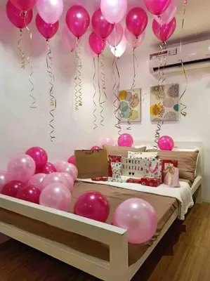 a room with pink balloons and a bed with a bunch of balloons at A private house with swimming pool- Unit1 in Kawit