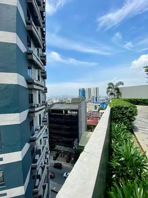 a view from the balcony of a building at Ikigai's Alpha Makati City View Condo with Balcony Perfect for Relaxation in Manila