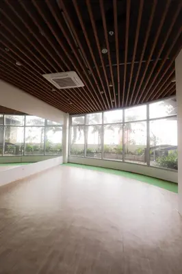 an empty room with a large room with windows at JP's Cityscape in Manila