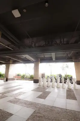 a giant chess set on the floor of a building at JP's Cityscape in Manila